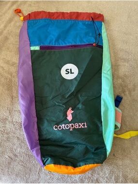 cotopaxi Multicolor Daypack in Green, Teal, Purple, Orange